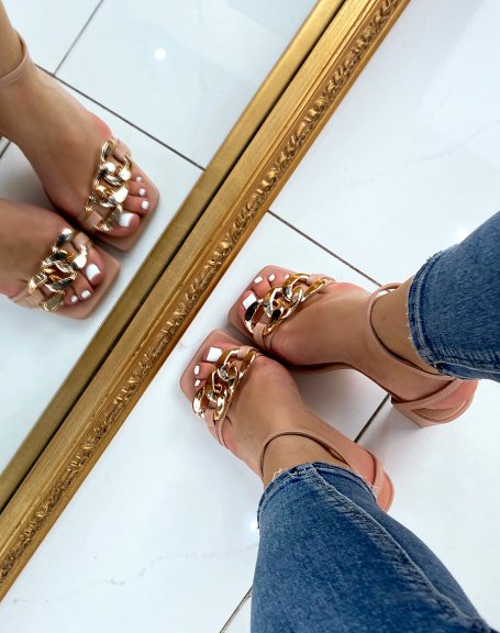 Nude heeled sandals with thin straps and gold chain