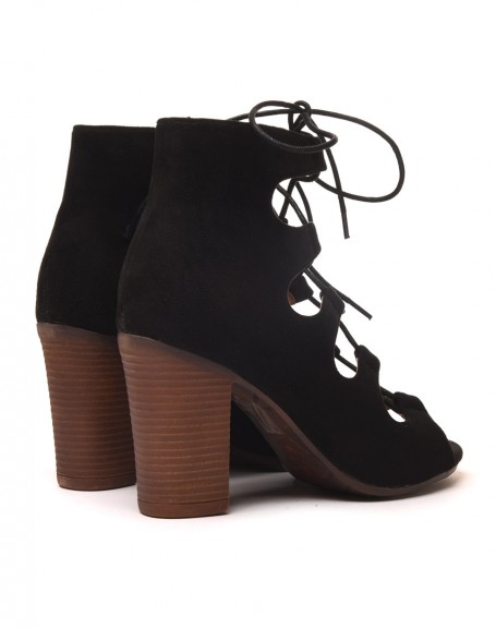 Open and laced black suede effect low heeled boots