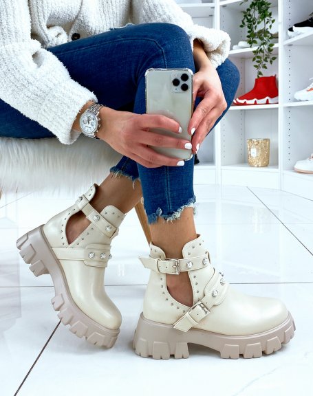 Open beige ankle boots with beaded straps