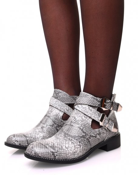 Openwork python-effect ankle boots with studs on the sole