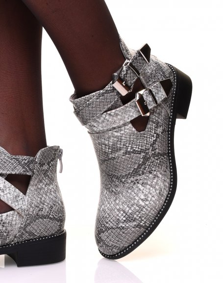 Openwork python-effect ankle boots with studs on the sole