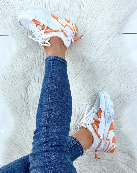 Orange dual-material sneakers with thick sole