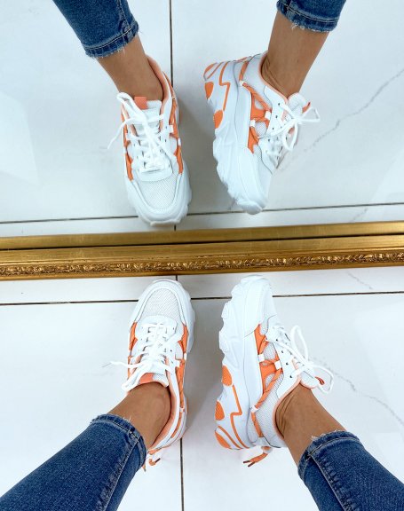 Orange dual-material sneakers with thick sole