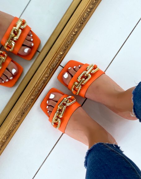 Orange flat mules with big golden chain and square toe