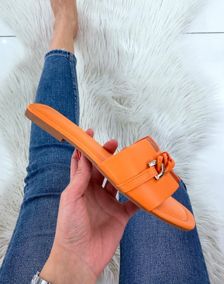 Orange flat mules with silver and orange chain