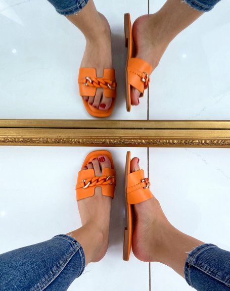 Orange flat mules with silver and orange chain