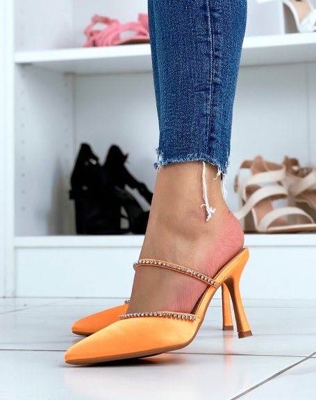 Orange mules with a pump-style heel