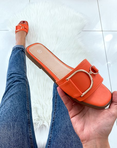Orange mules with chunky buckles