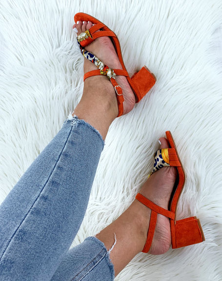 Orange sandals with braided strap with a printed scarf
