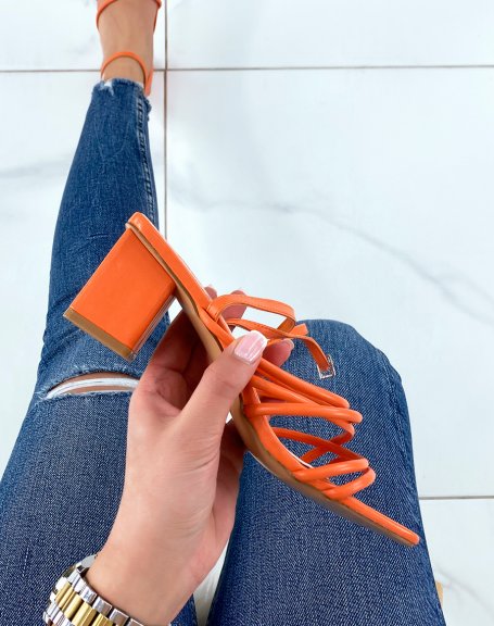 Orange sandals with heel and multiple straps