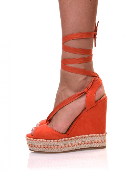 Orange wedges laced in suede