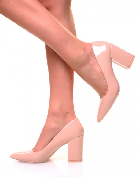 Pale pink patent pumps with square heels and pointed toes