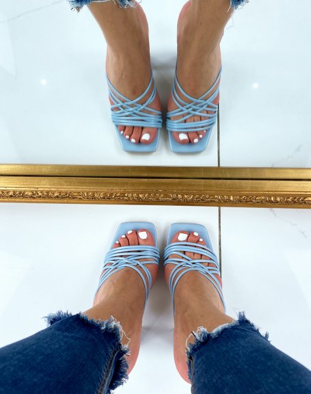Pastel blue heeled mules with crisscross straps