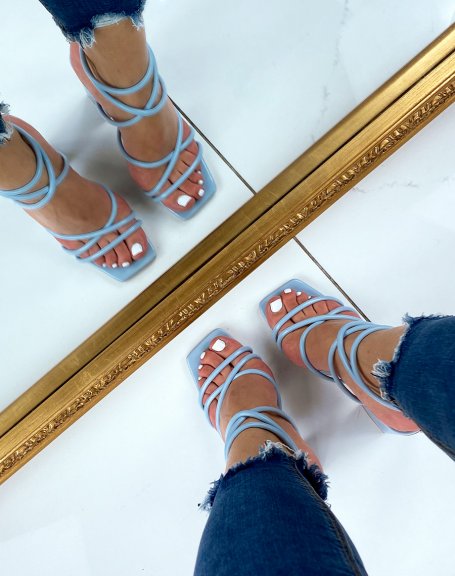 Pastel blue heeled sandals with multiple straps