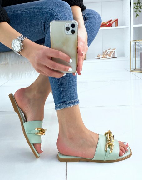 Pastel green mules with gold chain