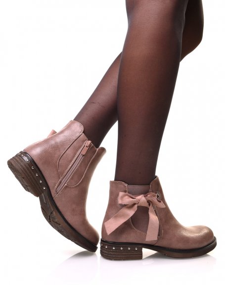 Pink ankle boots with bow and eyelets