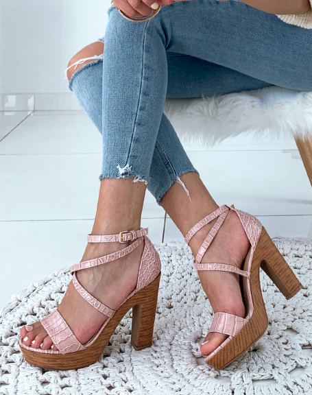 Pink croc-effect sandals with camel heels and platforms