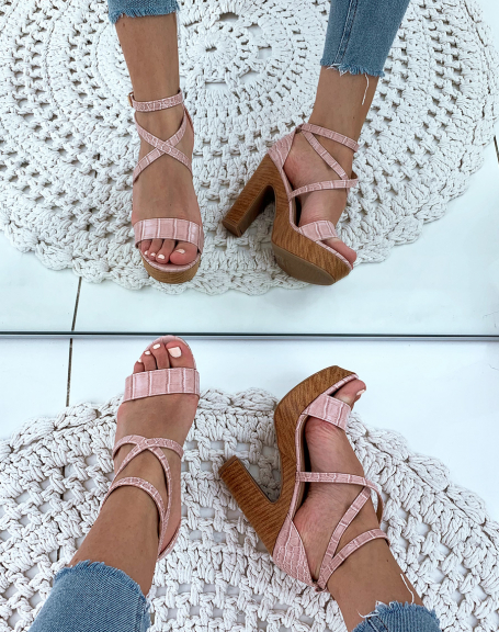 Pink croc-effect sandals with camel heels and platforms