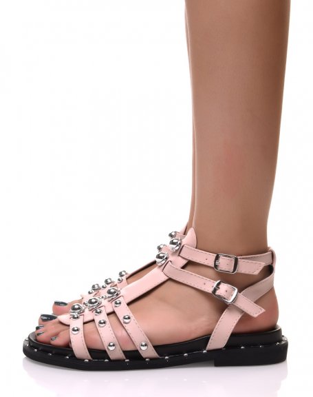Pink high-top sandals with studded straps