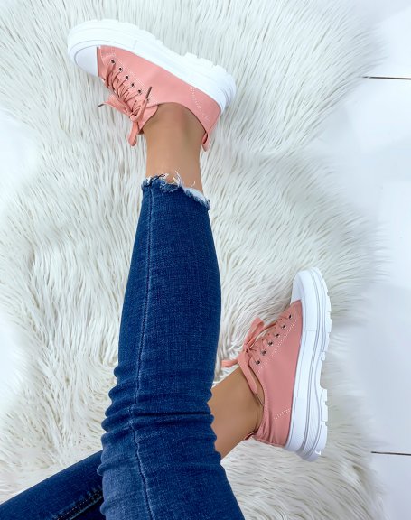 Pink sneakers with notched sole