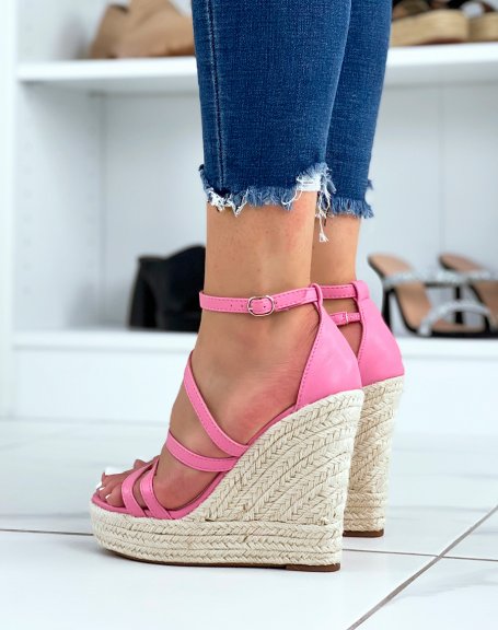 Pink wedge with criss-cross straps and high heel