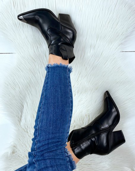 Pointed-toe black cowboy boots
