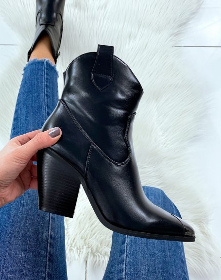 Pointed-toe black cowboy boots