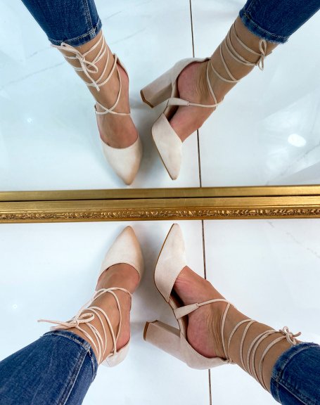 Pumps with a thick beige heel and long straps