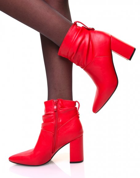 Red ankle boots with square heels and pleated-effect pointed toes