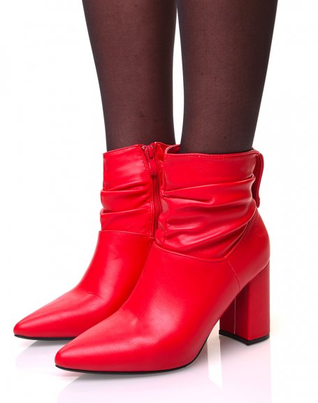 Red ankle boots with square heels and pleated-effect pointed toes