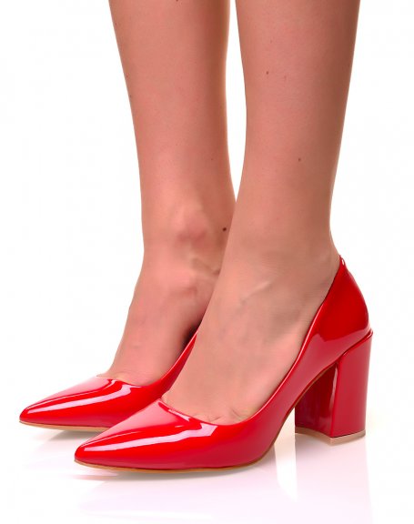 Red patent pumps with square heels and pointed toes