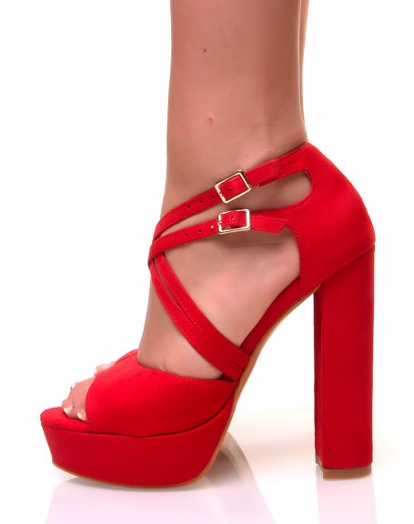 Red sandals with square heels and multiple straps