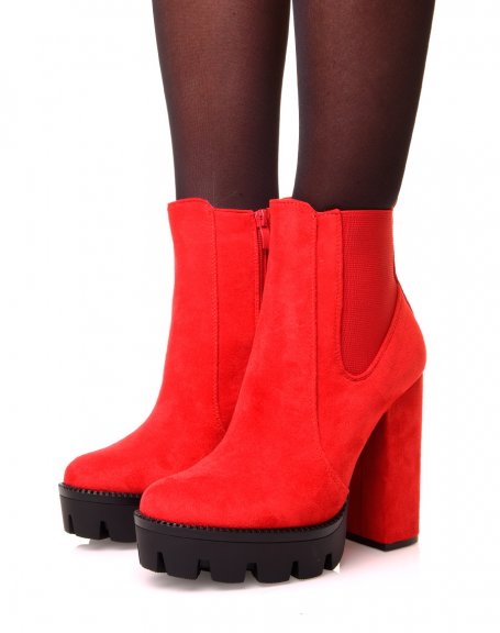 Red suedette ankle boots with heels and notched platforms