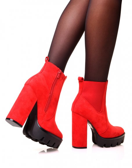 Red suedette ankle boots with heels and notched platforms