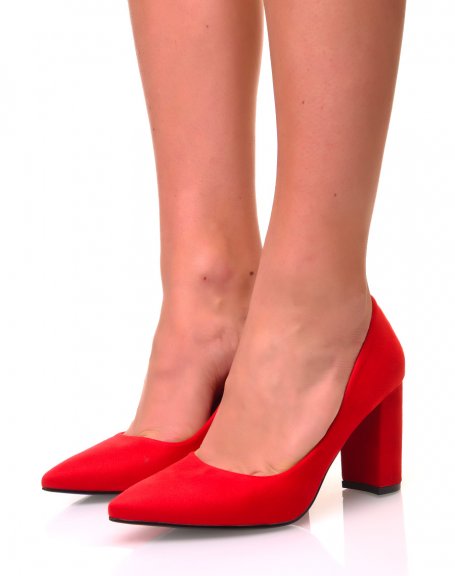 Red suedette pumps with pointed toes and wide heels