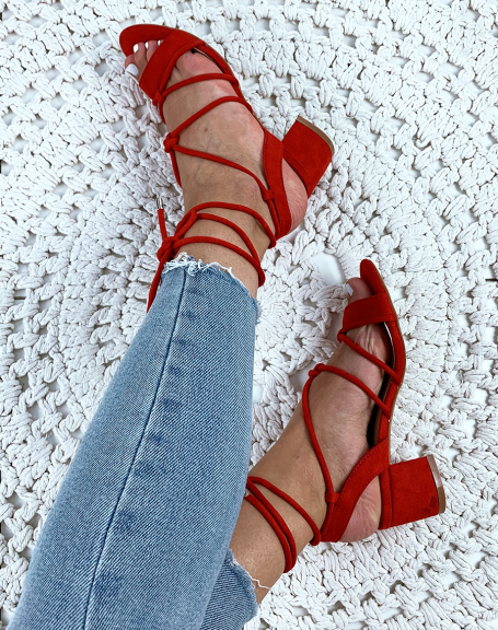 Red suedette sandals with low heels and ankle laces