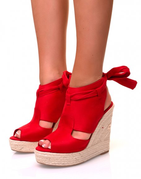 Red suedette sandals with wedge heels