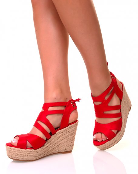Red suedette sandals with wedge heels