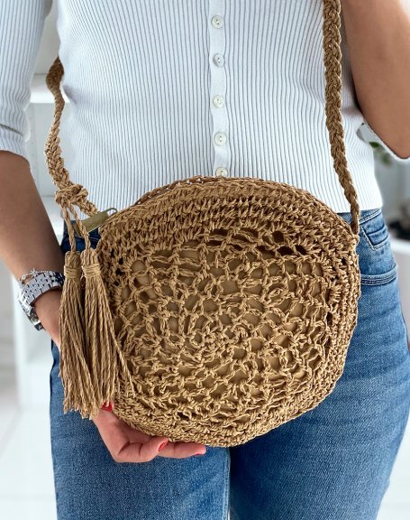 Round shoulder bag in natural straw