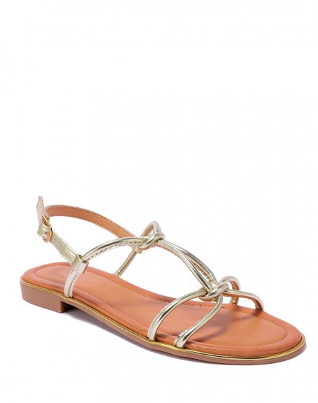 Sandals with golden knotted straps