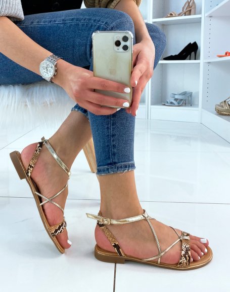 Sandals with golden straps and snake effect