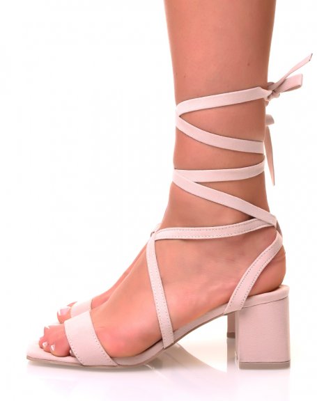 Sandals with small beige square heels and suede laces