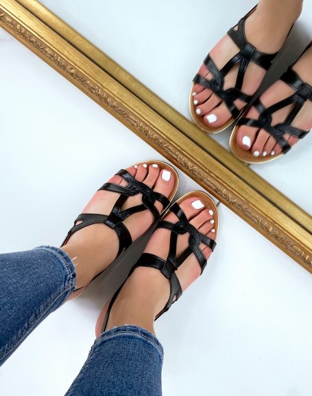 Shiny black sandals with buckled straps