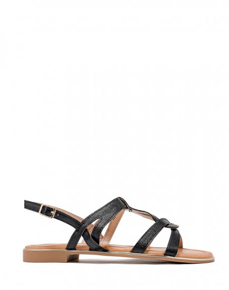 Shiny black sandals with buckled straps