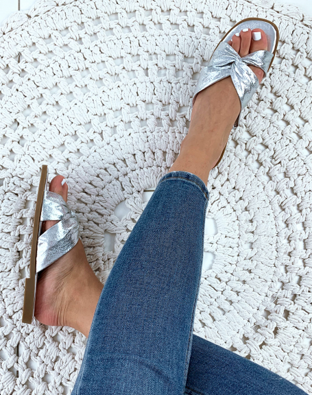 Silver flat sandals with crisscross straps