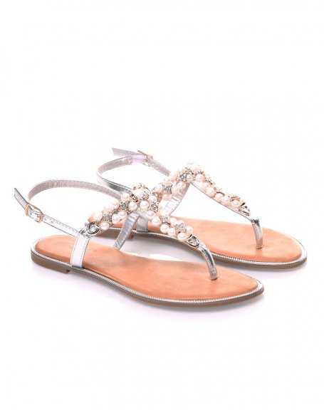 Silver sandals decorated with pearls