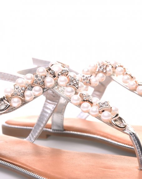 Silver sandals decorated with pearls