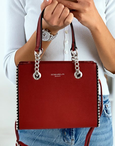 Studded red handbag