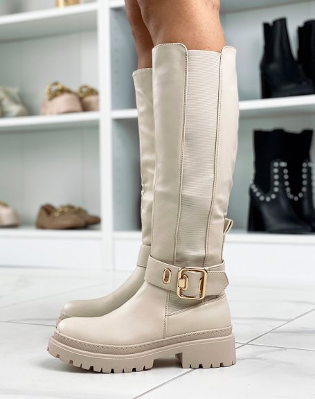 Tall beige boots with golden buckle
