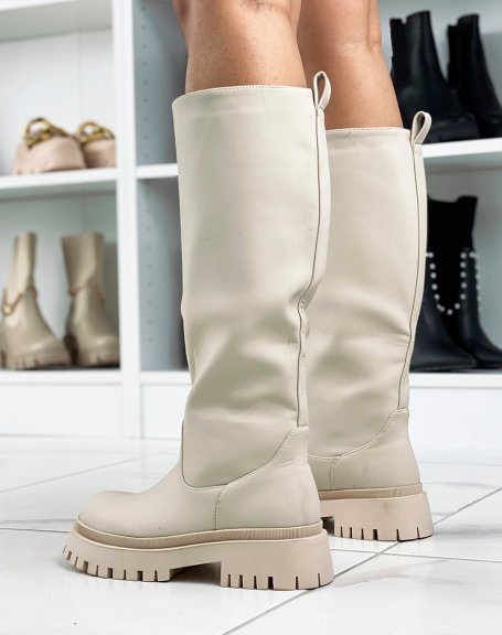 Tall beige rubber boots with chunky sole